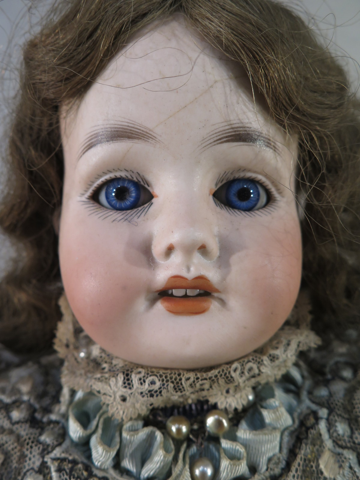 Poupée tête porcelaine Gebrüder Kühnlenz moule 44 29, bouche ouverte